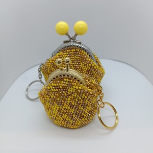 Hellgelbe gehäkelte Perlen Ohrhörer/Kabelhalter Set Lippenpflegestift-Etui Geldbörse Organisator Reise Schmuck-Verschluss Beutel Niedliche Portemonnaie