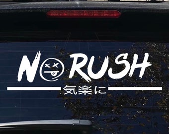 May include: White vinyl sticker with the words "No Rush" in a stylised font. A cartoon face with crossed eyes and a tongue sticking out is between the words "No" and "Rush". Below the words is a line and the text "気楽に" in Japanese.