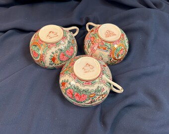 Rose medallion China cups with handles.