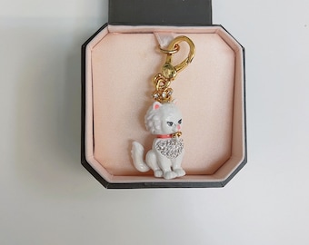 Kate spade flying outlet pig keychain