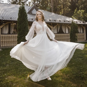Plunging V-neck boho rustic wedding dress long sleeve lace bohemian A line sample plus size gown, open back a line tulle wedding dress