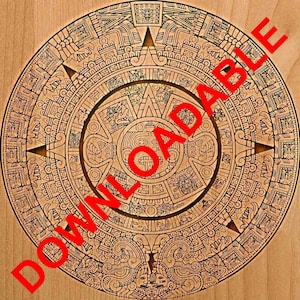 May include: A detailed, intricate carving of the Aztec calendar stone, also known as the Sun Stone, on a wooden surface. The stone is circular and features a central sun god with surrounding glyphs and symbols.