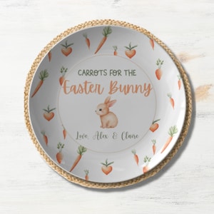 May include: White ceramic plate with a bunny rabbit and carrots. The plate says "Carrots for the Easter Bunny" and "Love, Alex & Claire".
