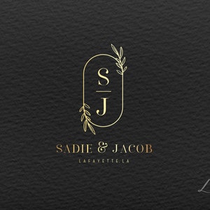 May include: Gold monogram logo with the initials "S & J" in a circle with floral accents. The text "Sadie & Jacob" and "Lafayette, LA" is below the monogram.
