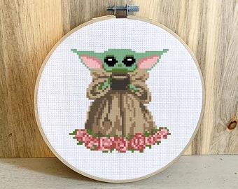 The Child With Soup & Flowers Cross Stitch Pattern