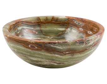 May include: A round bowl crafted from natural stone, showcasing a polished surface. The bowl's design incorporates green, brown, and white tones, producing a marbled appearance. The bowl's form is shallow, ideal for decorative or practical purposes.
