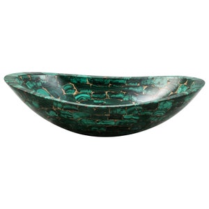 Malachite sink with golden joints