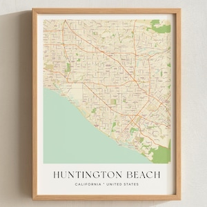 May include: A framed map print of Huntington Beach, California, United States, featuring a detailed street grid in tan and orange lines against a light green coastal background, with the text "with STREET NAMES" above the frame.
