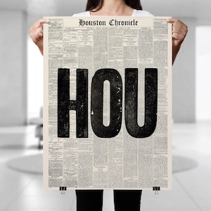 May include: A rectangular poster featuring a vintage Houston Chronicle newspaper page as the background, with the large, bold, black capital letters HOU printed prominently across the center, overlaying the columns of small, dense, black text.