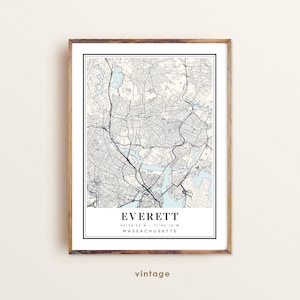 May include: A vintage style map print of Everett, Massachusetts. The map is in black and white with blue water features. The city name and coordinates are printed at the bottom of the map.