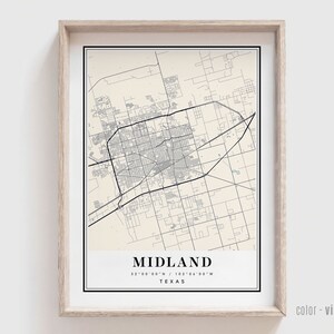 May include: A vintage style map print of Midland, Texas. The map is in black and white with a beige background. The city name and coordinates are printed at the bottom of the map.