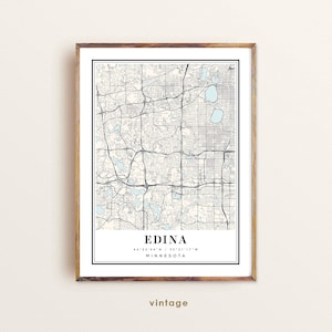 May include: A vintage style map print of Edina, Minnesota. The map is in black and white with blue water features. The city name and coordinates are printed at the bottom of the map.