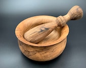 Mortar and pestle made out of walnut wood