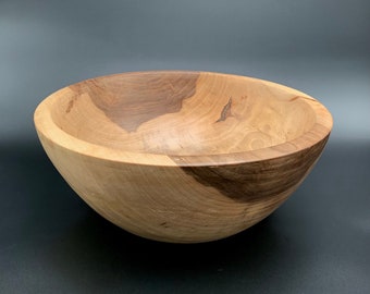 Handmade wooden bowl made out of walnut