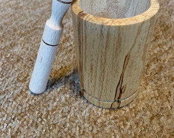 Small mortar and pestle made out of beech wood