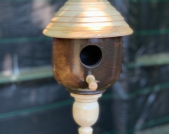 Wooden hand turned bird nest,house