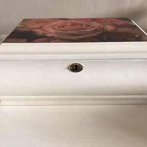 Beautiful solid wood curved jewellery box with mirror.