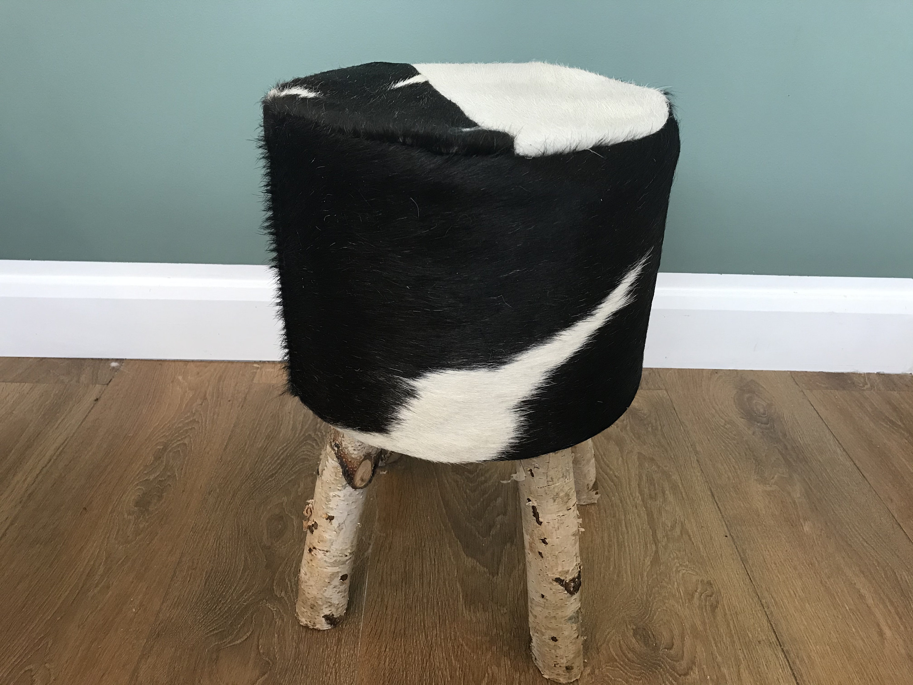 Cowhide footstool handmade ottoman bespoke cowhide stool Etsy