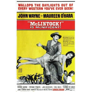 May include: A vintage movie poster for the Western film "McLintock!" starring John Wayne and Maureen O'Hara. The poster features a yellow background with a red and white title and a scene of John Wayne spanking Maureen O'Hara.