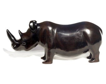 Smooth Zambian Ebony wood handcarved Rhino. Unique African Art Gifts, for home and office decor. Walking Long Horn Rhinoceros figurines.