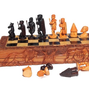 19&quot; Zulu Warriors Chess Set Large Masterpiece. Zimbabwe handcarved Foldable board with African Big Five Animals. Olive, Ebony, Mahogany Wood
