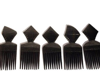 Ebony wood Carved Afro Comb. Unique African combs Express Shipping Worldwide. Used in the olden days as a symbol of love. Engagement gifts