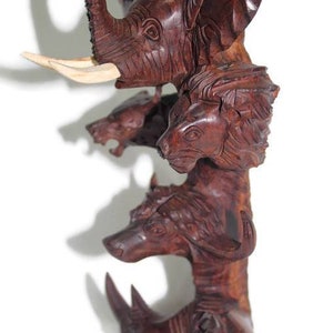 Ironwood Carved lifelike Big Five heads. Trunk Up Elephant, Lion, Cheetah, Buffalo and Rhino heads on a beautifully crafted hardwood piece.