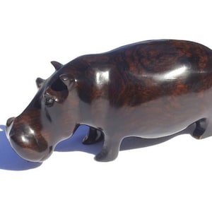 Lifelike Ebony Wood Carved Hippo Sculptures with visible wooden grains in the dark rich wood. Unique African, Christmas /housewarming gifts.