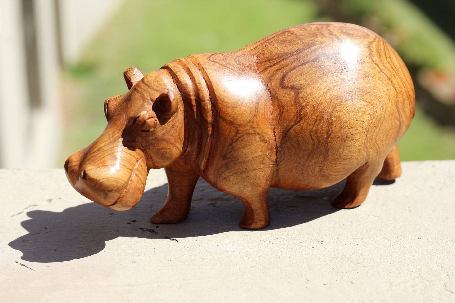 Olive wood Zimbabwean handcarved Hippo figurines. African Safari animals Art Decor. Handcrafted home/office decoration ready to ship gifts