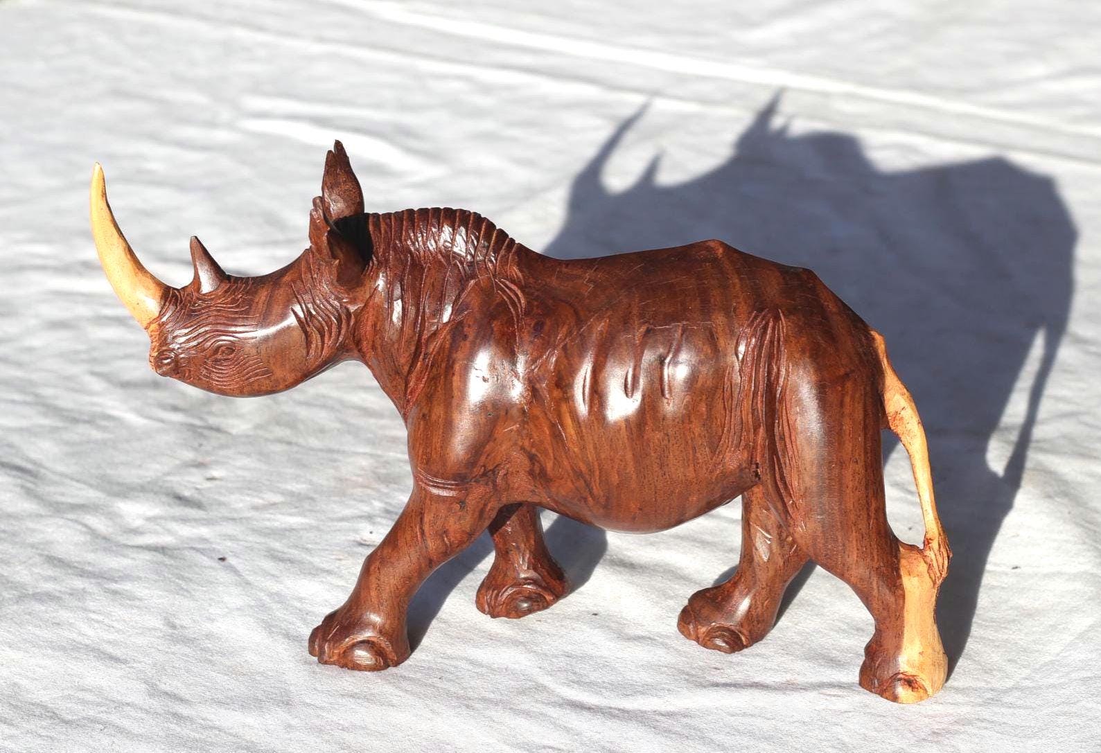 Smooth handcarved multi coloured Ironwood Rhino Sculpture. Zimbabwean lifelike Safari Animals Decor figurine. Unique African Art gift.