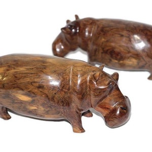 Tansanische Meisterwerk Eisenholz Nilpferdfiguren. Glatte hölzerne Safariskulpturen. Einzigartige handgefertigte afrikanische Kunst Express Versand weltweit