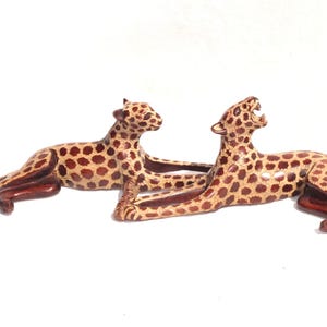 Sleeping Leopard Male and Female. Inner Olive wood dark brown polished and gouged spotted hand carved big cat Sculptures. African art Gifts