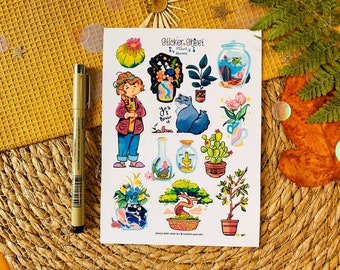 May include: A sticker sheet with colorful illustrations of plants, flowers, and a cat. The sheet includes a drawing of a girl holding a plant, along with the text "Sticker Sheet Plant Mama". The stickers are on a white background.