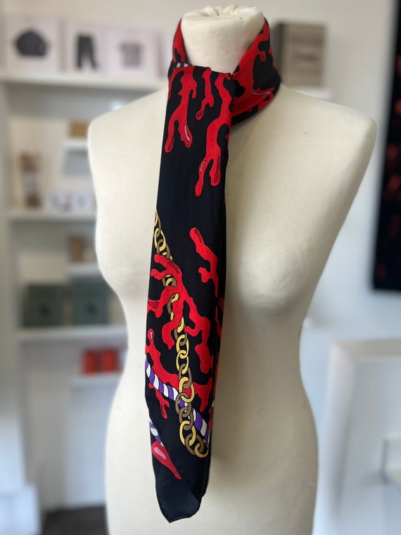 Striking black and red coral and sea anchor nauti… - image 9