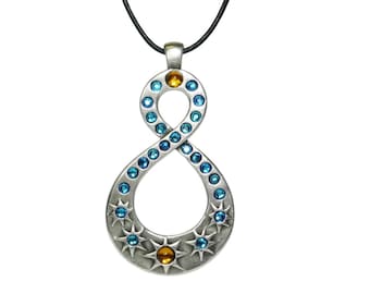 The Analemma Pendant represents the Sun&#39;s journey over a year. The ends represent the Winter-Summer Solsistices, the intersection of the Equinoxes.