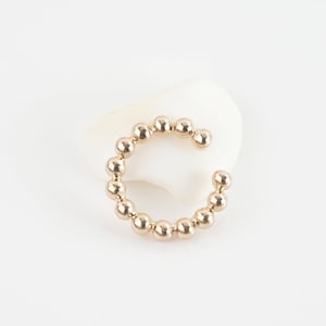 Brinco folheado a ouro sem furo de cartilagem (topo da orelha), argola minimalista ou piercing falso para mulheres.