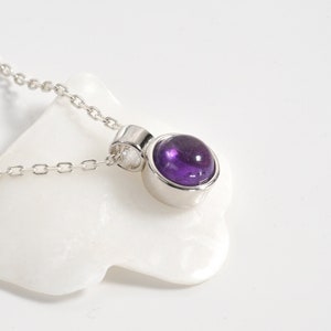 Natural amethyst cabochon necklace with sterling silver chain and pendant.