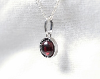 Garnet necklace with chain and silver pendant.