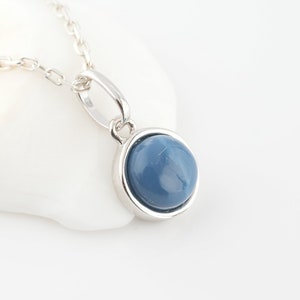 Necklace with a natural blue opal in cabochon, minimalist silver pendant, women's jewelry with blue stone.
