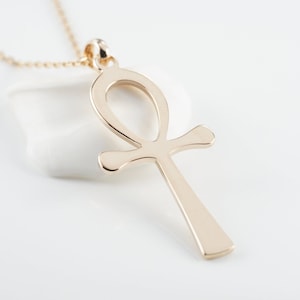 Gold plated Ankh cross pendant (cross of life, or Egyptian believe), minimalist jewelry.