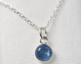 Necklace with Kyanite pendant, natural blue stone on silver jewelry.