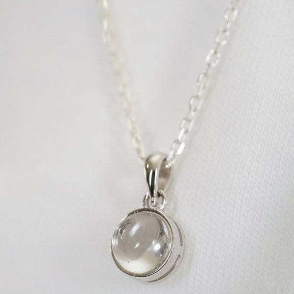 Natural rock crystal cabochon necklace, with silver chain and pendant, minimalist jewelry for women.