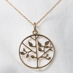 Tree of life necklace with a round and gold pendant