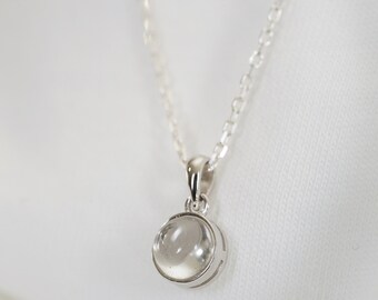 Natural rock crystal cabochon necklace, with silver chain and pendant, minimalist jewelry for women.