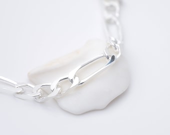4mm silver chain figaro mesh, 4mm wide and 21, 45, 50, 55, 60 centimeters long.