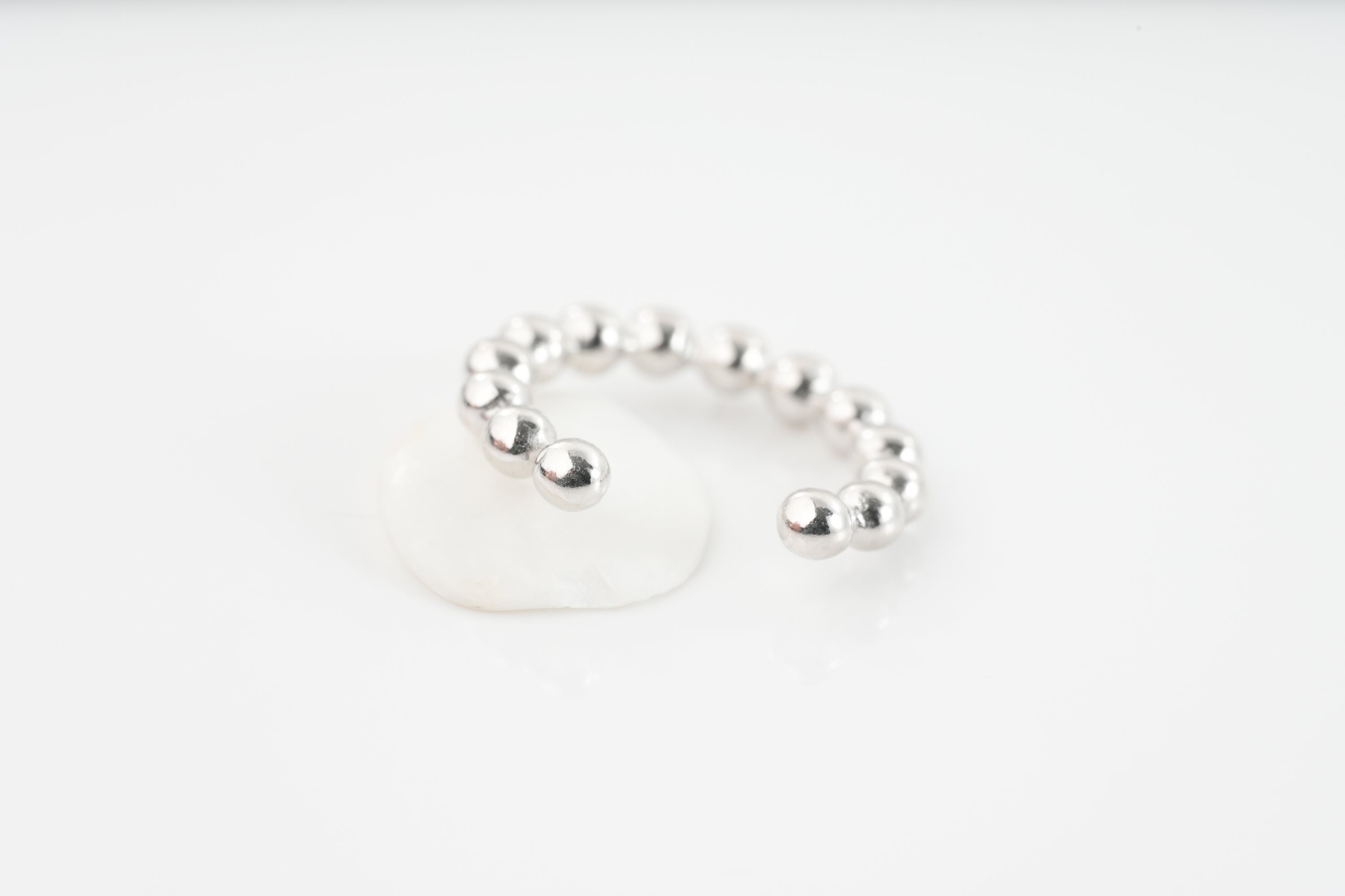 Silver earring without cartilage hole (top of ear), minimalist ear hoop or fake piercing for women.