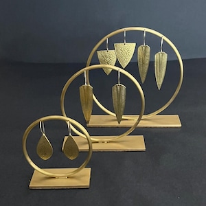 Set of three circle brass earring stands