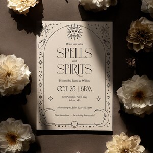 May include: An invitation for a "Spells and Spirits" event, featuring floral accents and a celestial design. The invitation includes the date, time, and location, with the text "Come in costume - the witching hour awaits!"