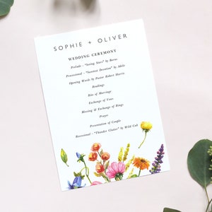 May include: Wedding ceremony programme with a floral design featuring a variety of flowers in shades of pink, orange, yellow, blue, and purple. The programme lists the order of events for the ceremony, including the prelude, processional, readings, exchange of vows, and recessional.