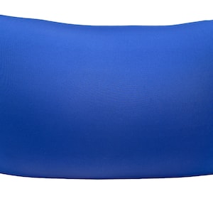 May include: A solid blue rectangular pillow. The pillow is a vibrant shade of blue and appears to be made of a soft fabric. The pillow is designed for comfort and support, suitable for use on a bed or couch.
